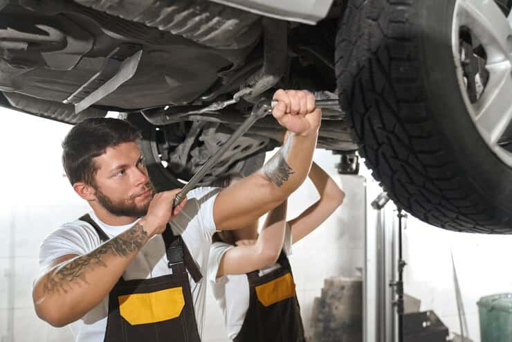 Man and Woman are Repairing Car
